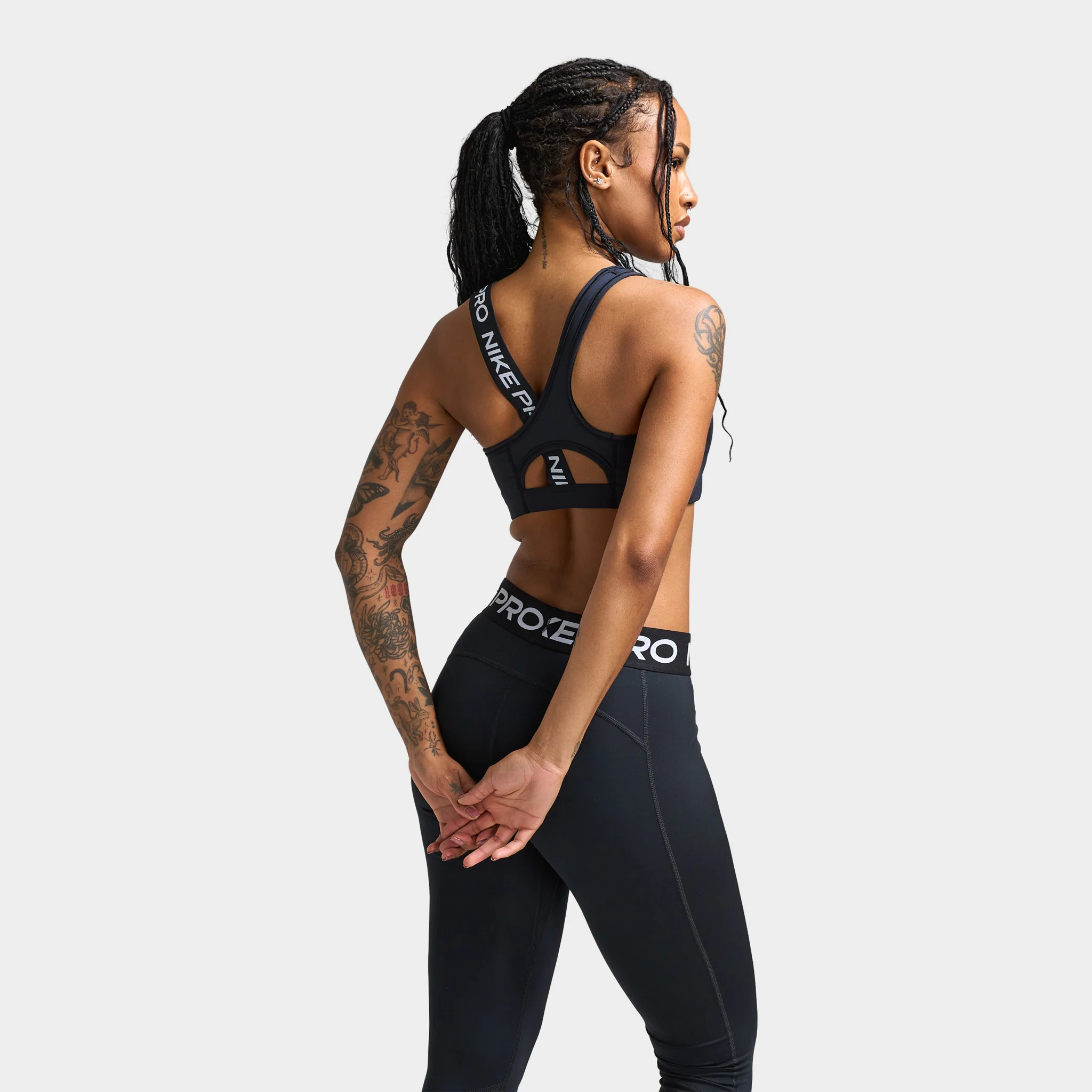 Nike Pro Women's Swoosh Asymmetrical Medium Support Bra Black / Sail