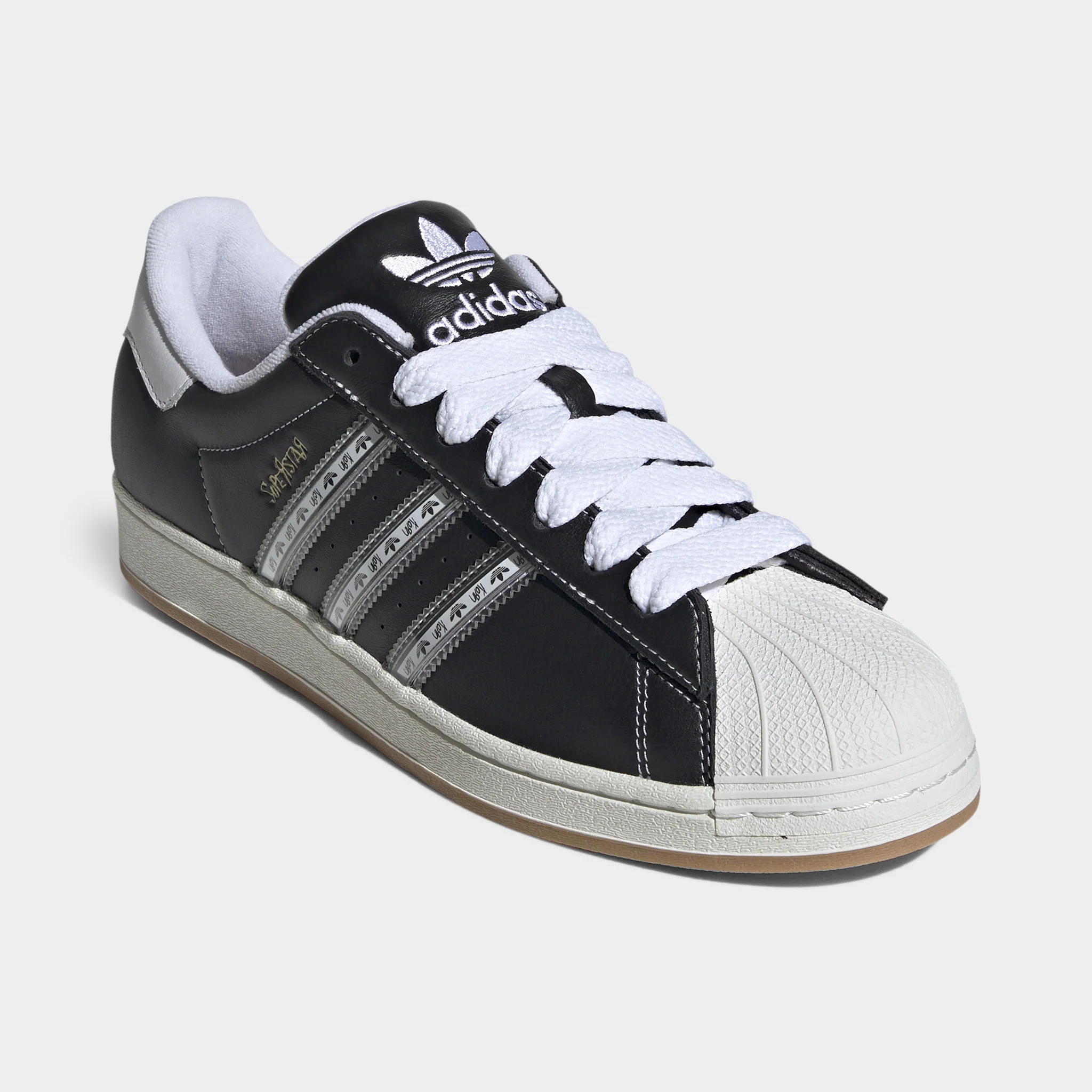 adidas x Korn Superstar Core Black / Translucent - Better Scarlet