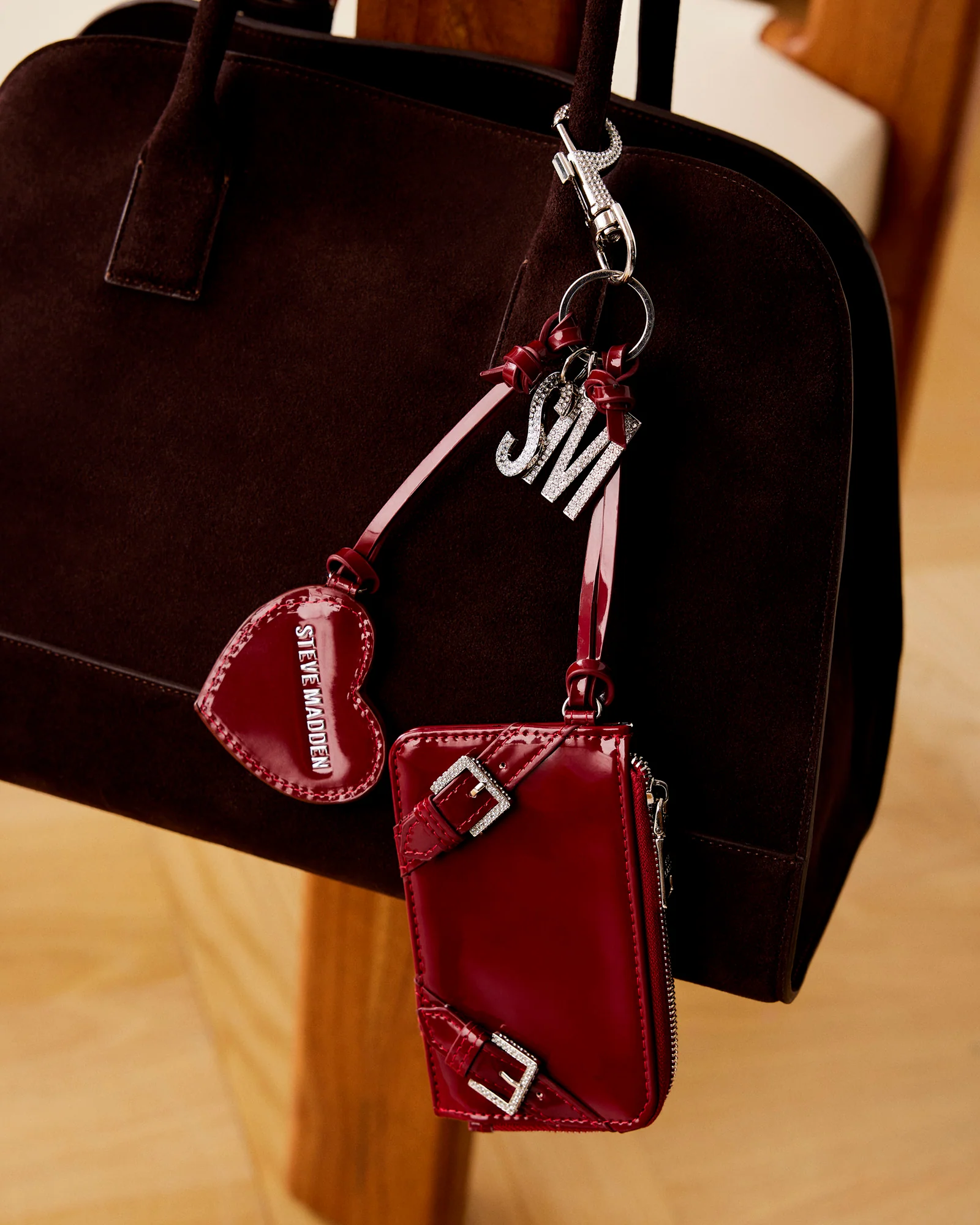 AMORE BAG CHARM WINE PATENT