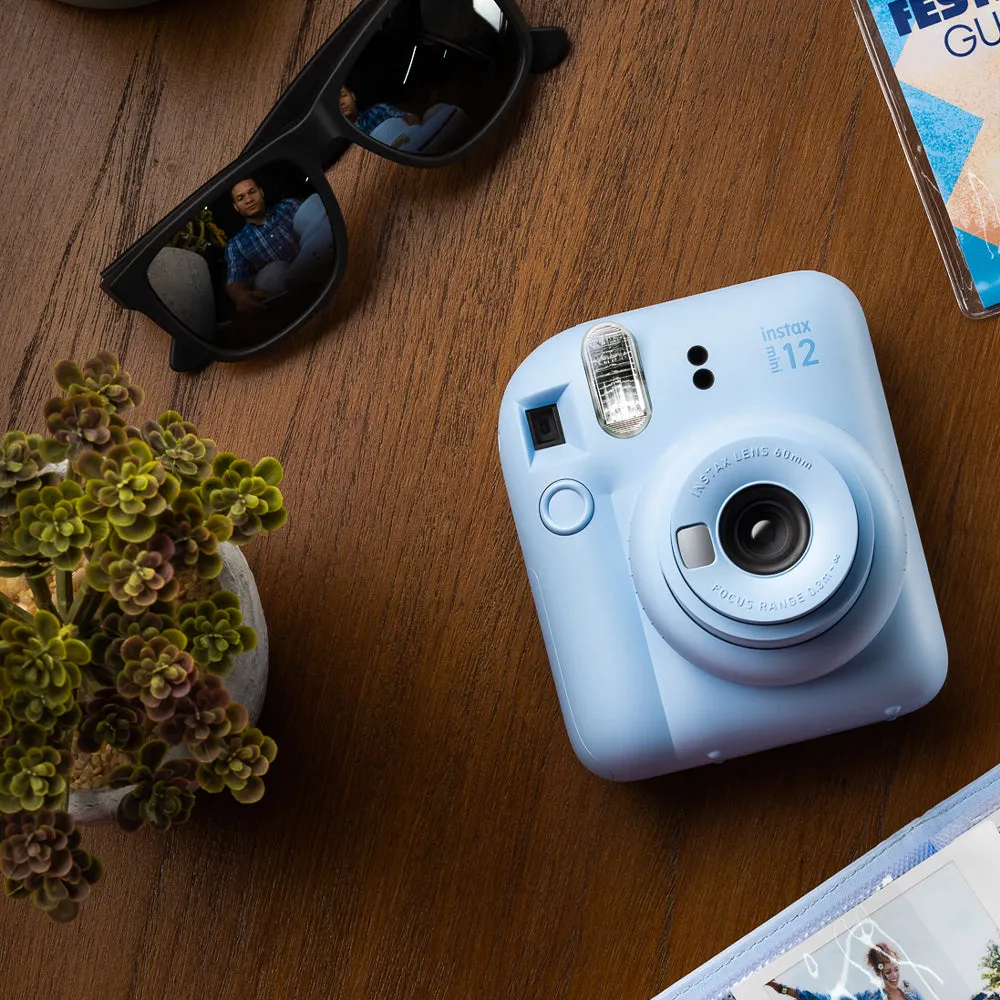 Paquete Instax Mini 12 Azul + 20 Fotografías + 1 Photobook