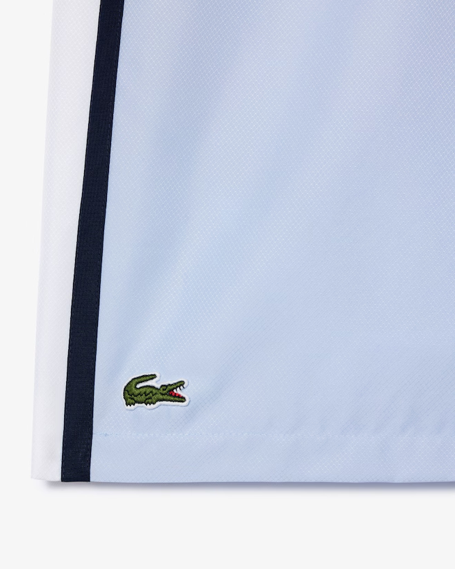 Shorts de tenis ligeros con rayas color block para hombre