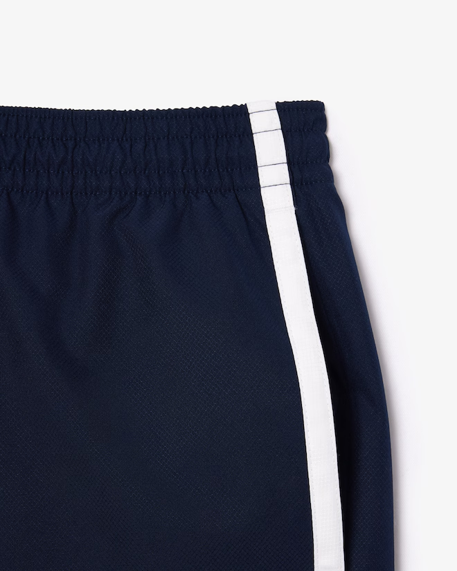 Shorts de tenis ligeros con rayas color block para hombre