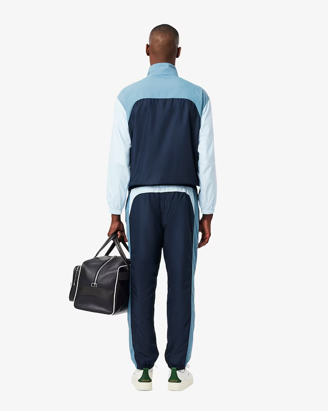 Pantalones deportivos ligeros repelentes al agua para hombre