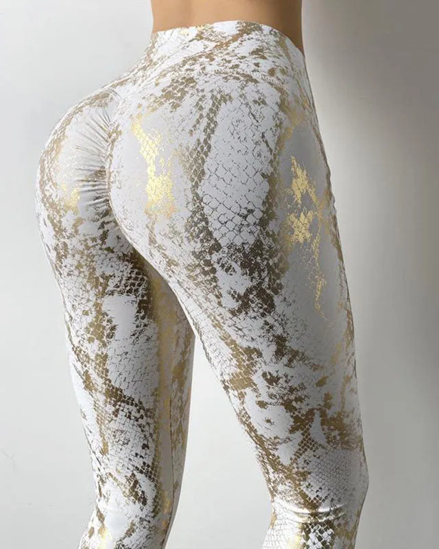 Pantalones de fitness de cadera de melocotón con patrón de piel de serpiente de cintura alta para levantamiento de glúteos