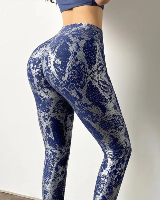 Pantalones de fitness de cadera de melocotón con patrón de piel de serpiente de cintura alta para levantamiento de glúteos