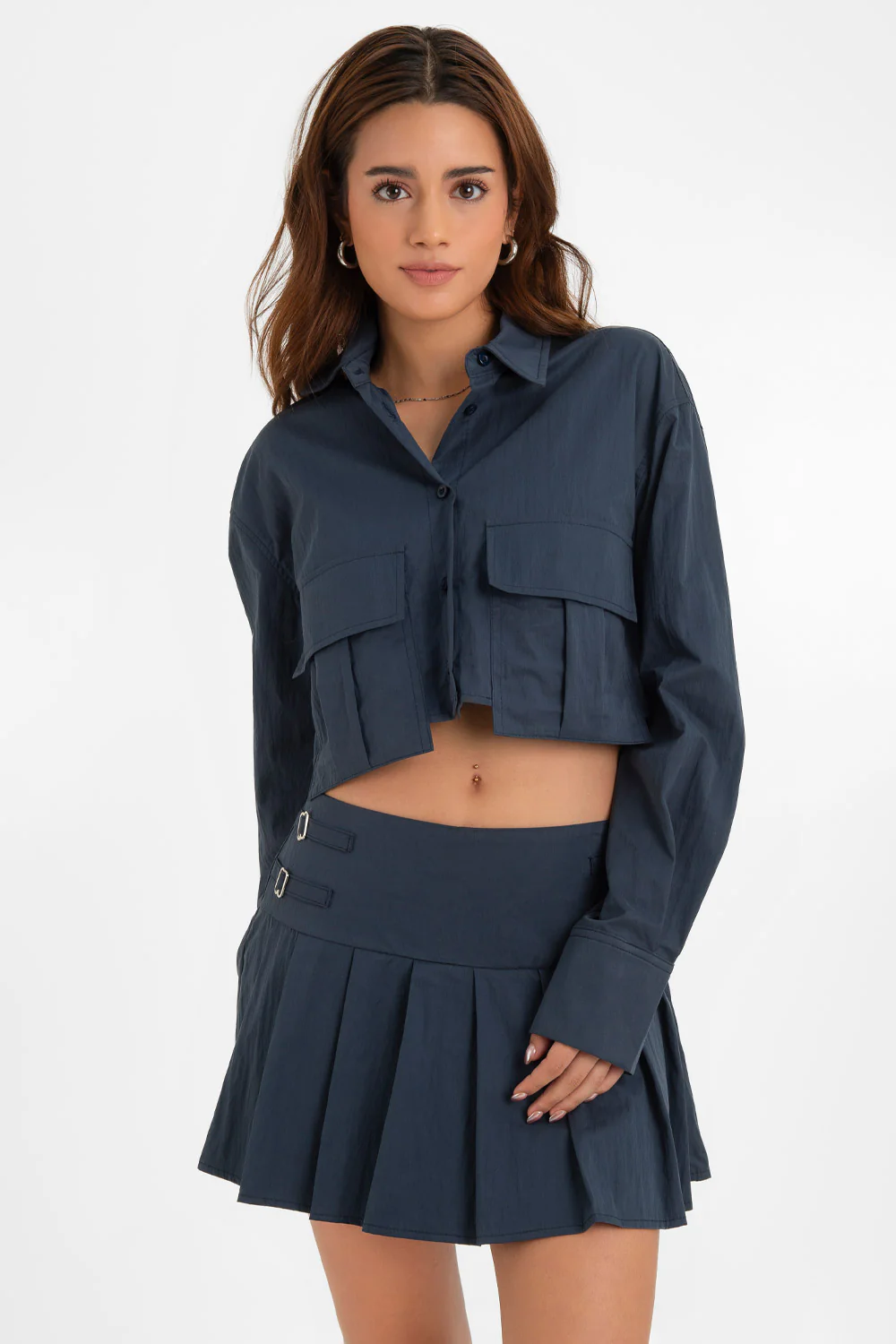 Falda short corto tableado con trabillas