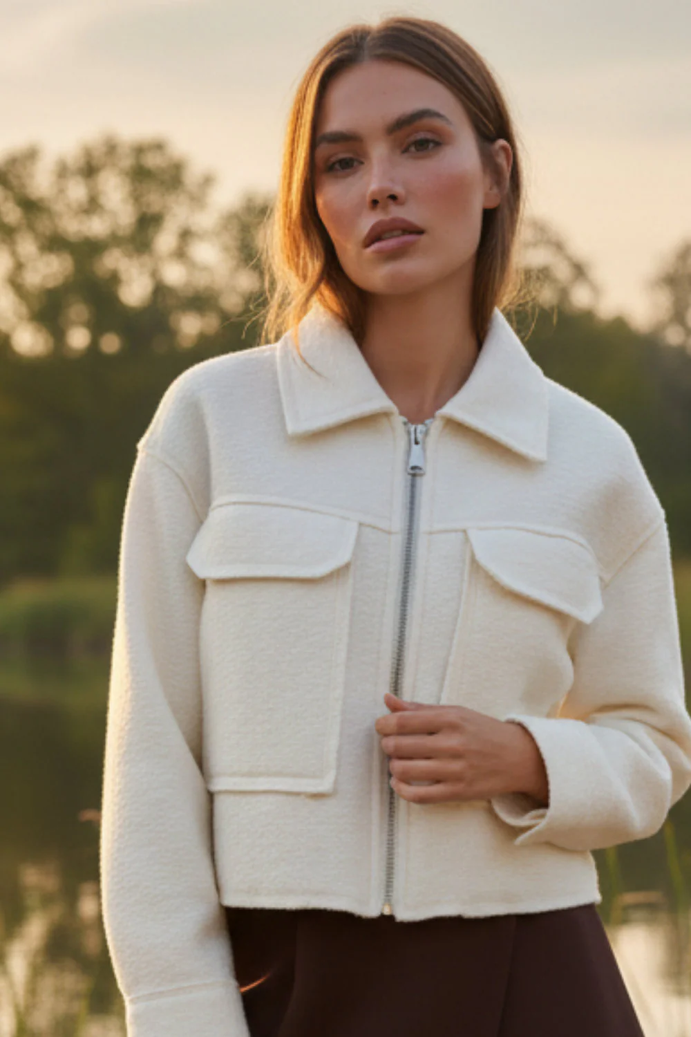 Chamarra bouclé bolsillos