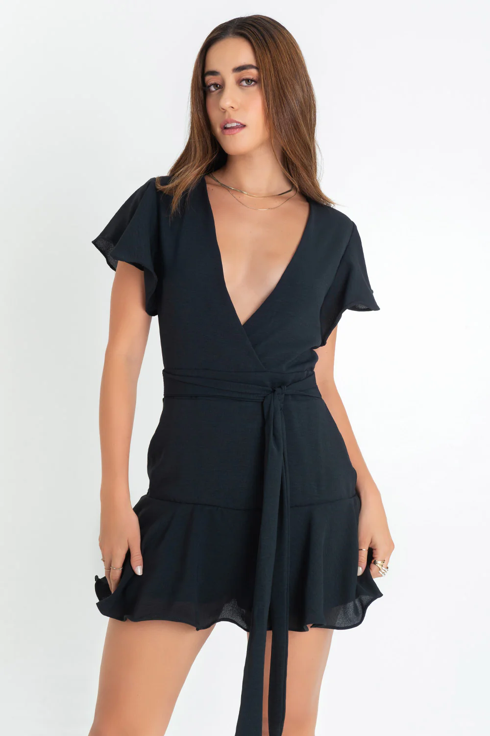 Playsuit manga corta con olanes escote v
